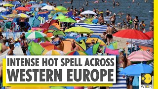 People seek ways to cool off as heatwave bakes Paris | Western Europe Heatwave