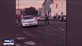 Man frustrated by Oakland sideshow gets attacked by crowd