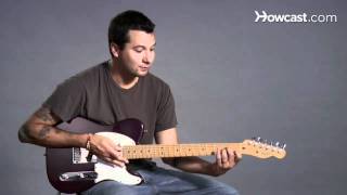 How to Play an F Minor Barre Chord | Guitar Lessons