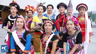 Girls of different ethnic groups show off traditional dances