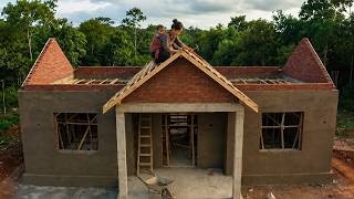 A Single Mom and Her Little Child Building a Cozy Home Beneath the Hills
