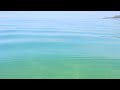 sandy desert and green sky under the waters video by diana dastan