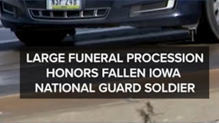 Large funeral procession honors fallen Iowa soldier