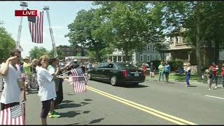 Crowds line Sumner Avenue to support Sullivan family
