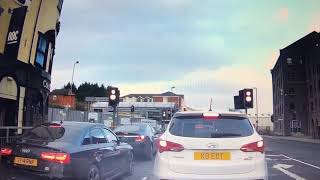 AUDI CRASHES INTO PSNI CAR.