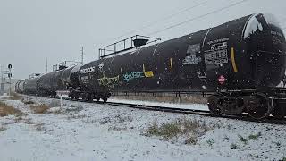 Southbound CPKC switcher crosses the diamond  at St. James JCT.  Snowy 🌨 November 25th, 2024.