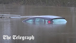 UK Weather: Flood warnings continue as cars, boats, and businesses are submerged by water