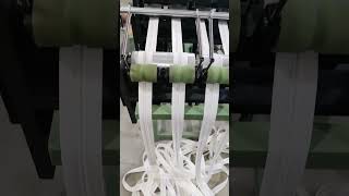 high speed zipper tape weaving machine .