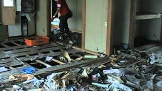 Volunteers clearing a house in Iwaki