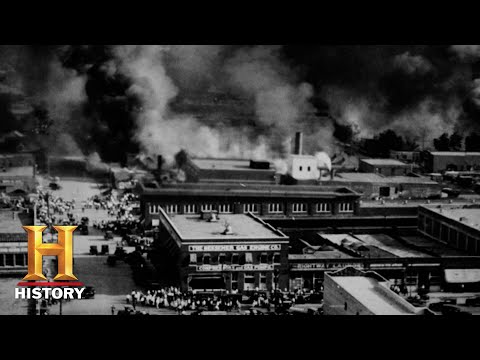 What was the main cause of race riots in American cities?