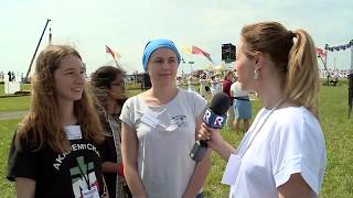 Thousands of young Poles gather for a Catholic event celebrating Poland's christianization in 966