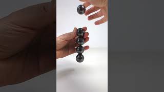 Magnetic Balls in Slow Motion