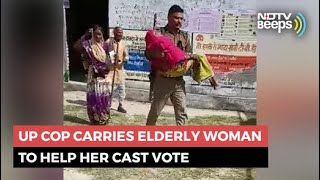 UP Cop Carries Elderly Woman To Help Her Cast Vote