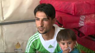 Displaced Iraqis shelter in Baghdad camps