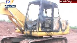 Miscreants Puts Fire To A JCB In Mallampalli Of Warangal District