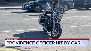 12 News Now: Providence police officer hit by car during funeral escort