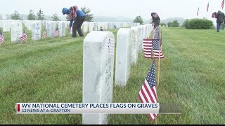 West Virginia National Cemetery places flags on graves for Memorial Day