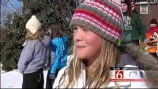 Tulsa Area Kids Enjoy Sledding On The Snow