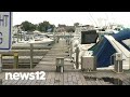 Suffolk police probe racist graffiti found on 2 boats in Bay Shore Marina | News 12