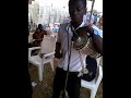 olajosh playing talkingdrum with Nigeria Navy band