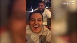 Men run red light in a shopping trolley and get flashed by camera