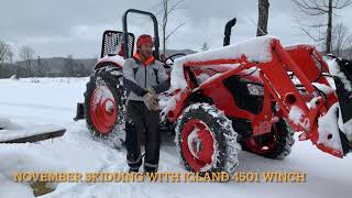 Skidding spruce with Igland forestry winch on Kubota tractor