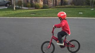 Aidan riding his bike