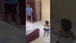 Baby arguing with dad