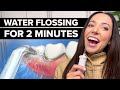 Dental Hygienist Water Flossing Her Own Teeth