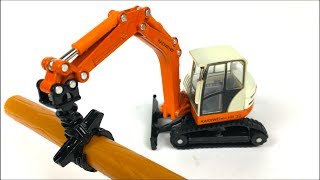 KAIDIWEI MIGHTY MACHINES CONSTRUCTION COMPACT EXCAVATOR WITH GRAPPLE ON THE JOB SITE - UNBOXING