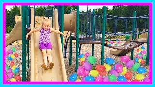 Playing at the park on the Kids Playground & Surprise Egg Toy Hunt W/ Play Doh Girl & Fun Factory