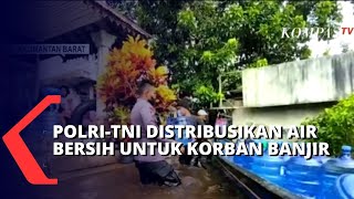 Hampir Sebulan Banjir Tak Surut, Polri dan TNI Berbondong-Bondong Bantu Warga Korban Banjir Sintang