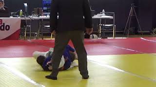 Carmen Throws a Strong Opponent in Garden State Judo Classic.