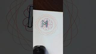 M red orange spirograph painting