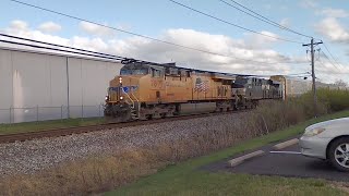 UP 7877 leads NS 188 Manifest Autorack Train West at Sharonville, OH