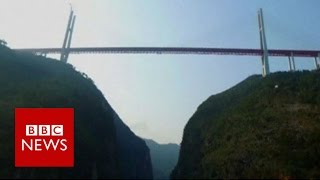 World's highest bridge opens in China - BBC News