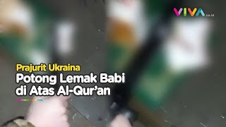 BIADAB! Prajurit Ukraina Potong Lemak Babi di Atas Al-qur'an