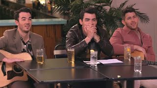 Watch the Jonas Brothers Get DRUNK and Sing NSFW Songs With Seth Meyers!