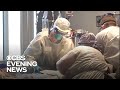 CBS News exclusive: Inside a coronavirus ward at Wisconsin's largest hospital