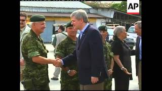 WRAP Canadian PM arrives; ADDS handshake with Haiti President Preval