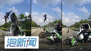 26/07: 摩托猛撞抛锚轿车  骑士飞抛半空