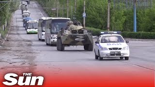 Russian tanks escort 'surrendered Azovstal defenders' from Mariupol