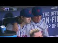 nym@tex collins talks to degrom in the dugout