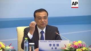 China's Li reaffirms belief in free trade