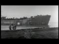 us navy uss lst 340 ablaze after being attacked by japanese dive bombers off the ...hd stock footage