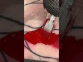 slow motion tattooing 35mag tattoo needles close up color packing