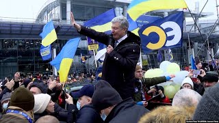 Defiant Ex-President Poroshenko Returns To Ukraine To Face Treason Charges