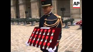 France decorates UK, US and French veterans on D-Day anniversary