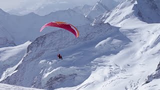 Ueli Steck Paraglides Between Mountains In The Swiss Alps