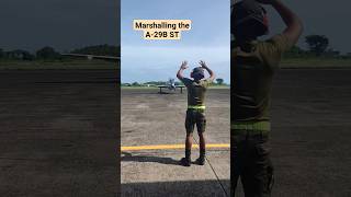 It's a Visual signaling between ground Personnel and Pilots on an Aircraft #marshall #marshalling